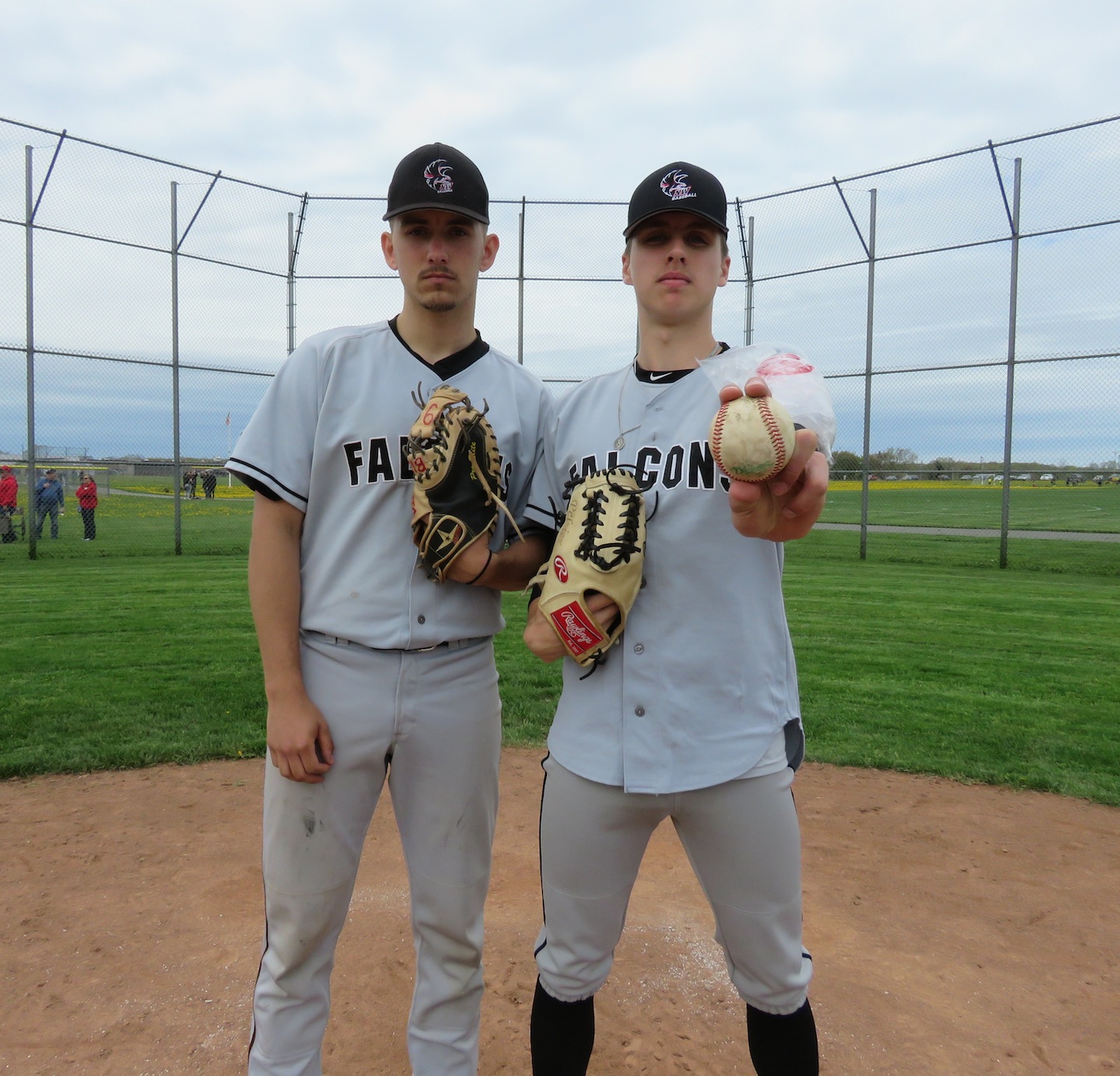 Pictured, Ethan Guthrie (catcher) and Tommy Peltier pose with the game ball from the lefty's no hitter versus Lockport. (Photos by David Yarger)